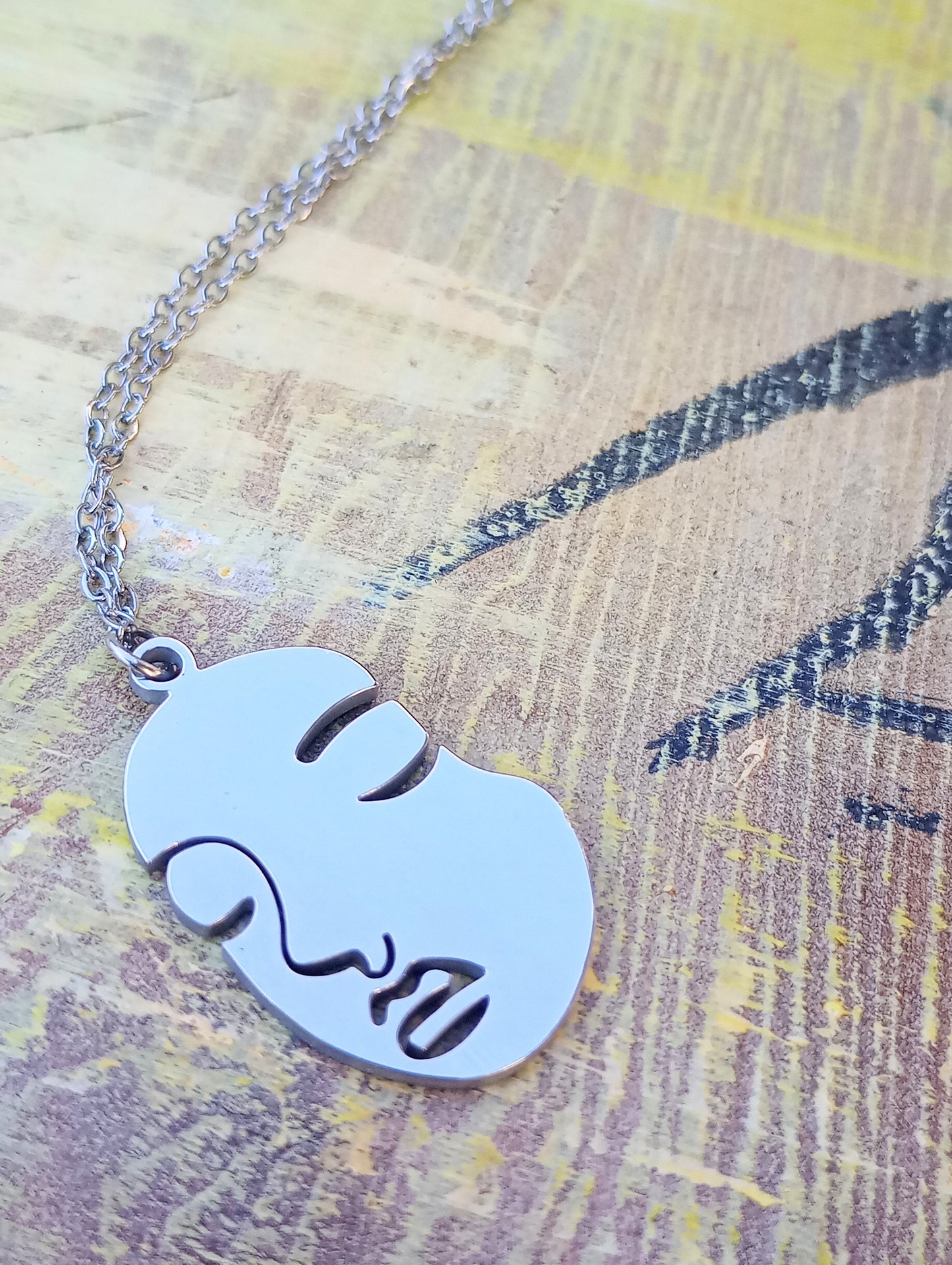 Face necklace