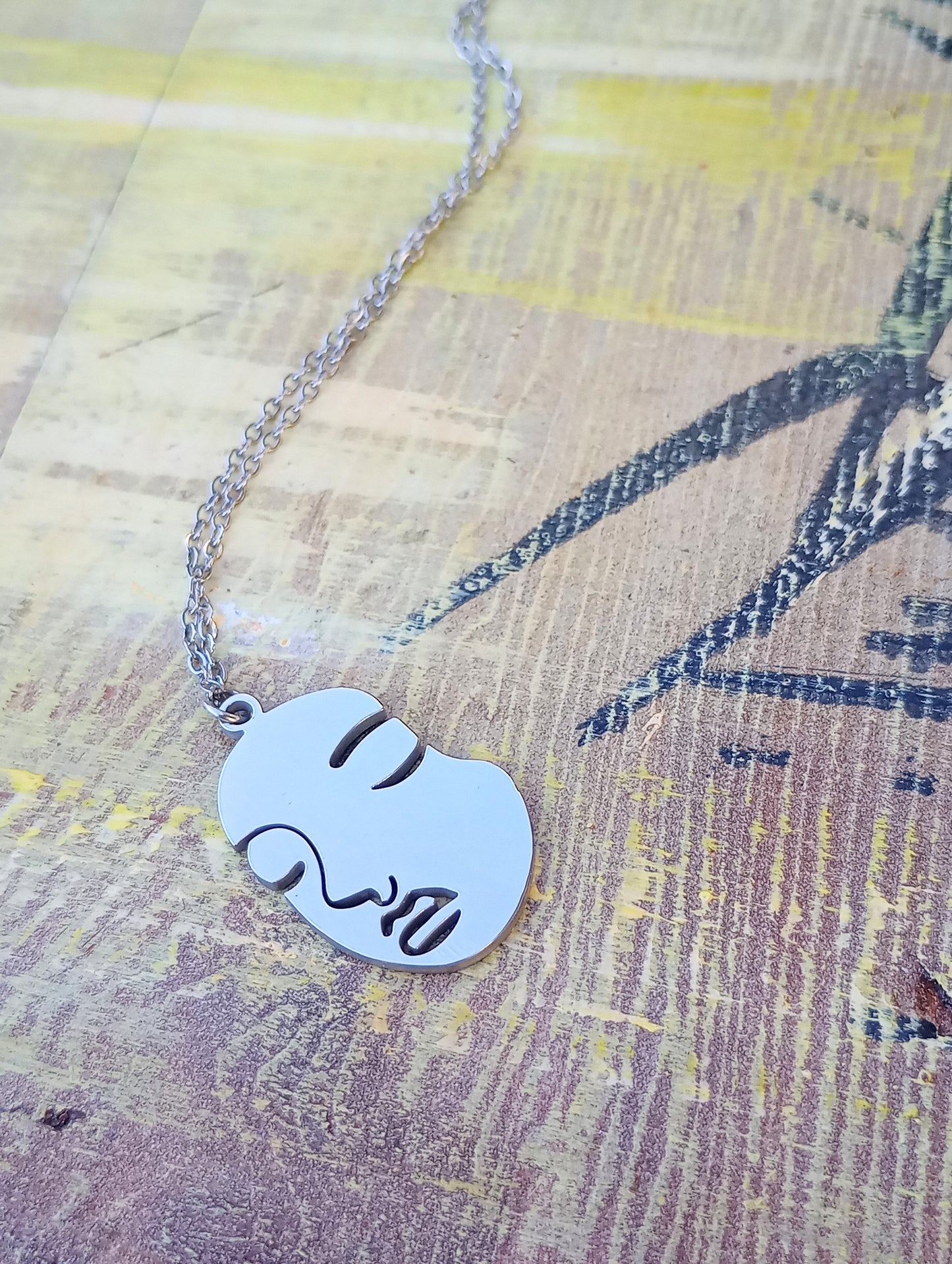 Face necklace